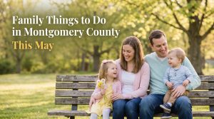 Young family with two small children sitting on a wooden park bench on a spring morning in Montgomery County PA